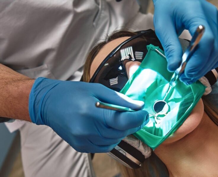 endodontist-performs-root-canal-treatment