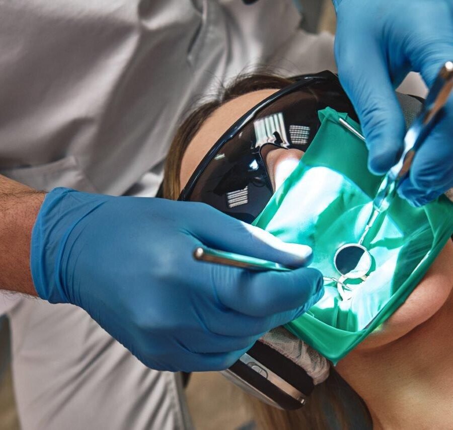 endodontist-performs-root-canal-treatment