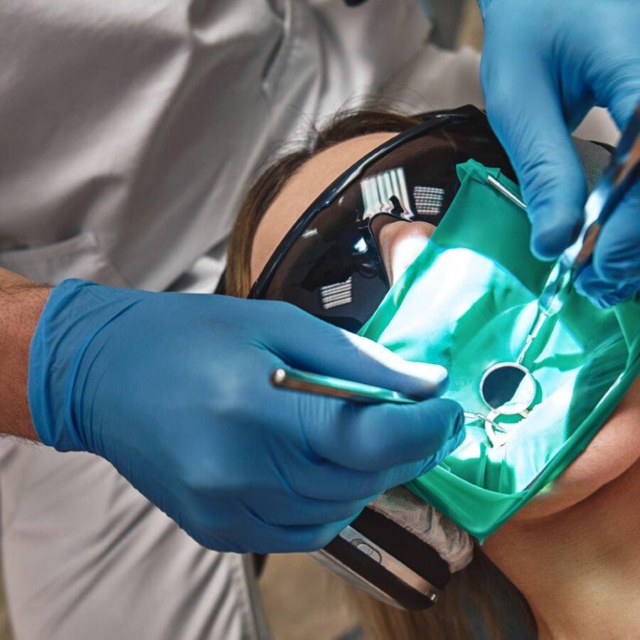 endodontist-performs-root-canal-treatment